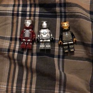 I am selling 3 LEGO marvel iron man figures
